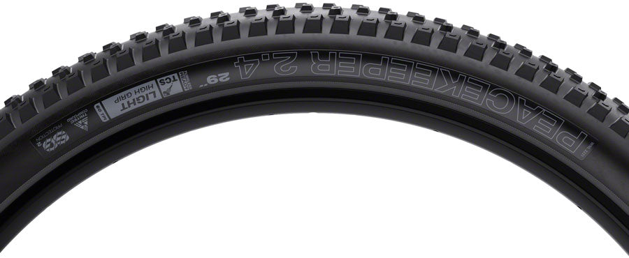 WTB Peacekeeper Tire - 29 x 2.4 TCS Tubeless Folding BLK/Tan Light/Fast Rolling TriTec SG